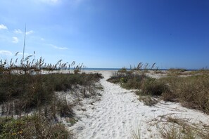 On the beach, sun-loungers, beach towels