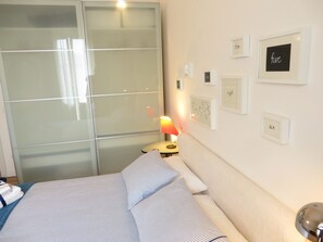 1 bedroom, desk, iron/ironing board, travel cot