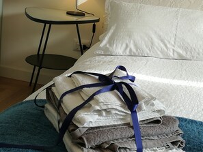 1 bedroom, desk, iron/ironing board, travel crib