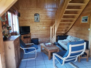Télévision, cheminée, lecteur de DVD
