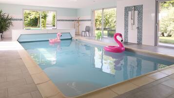 Alberca techada y alberca climatizada