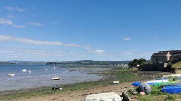 Beach nearby, sun loungers