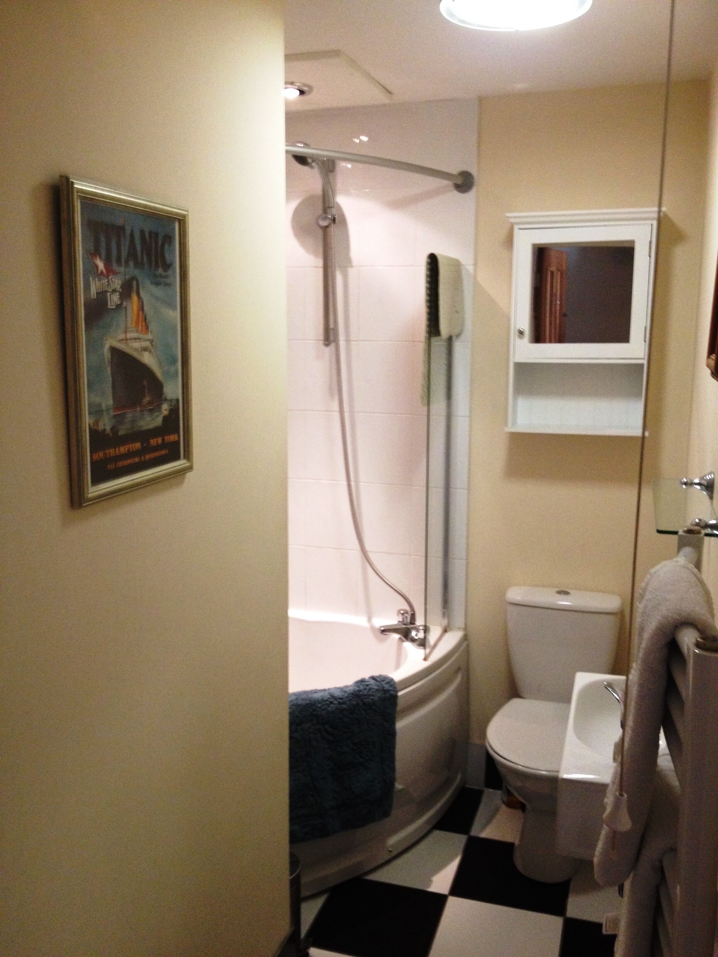 Bathtub, hair dryer, towels, soap