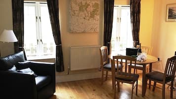 Smart TV, fireplace, DVD player, books