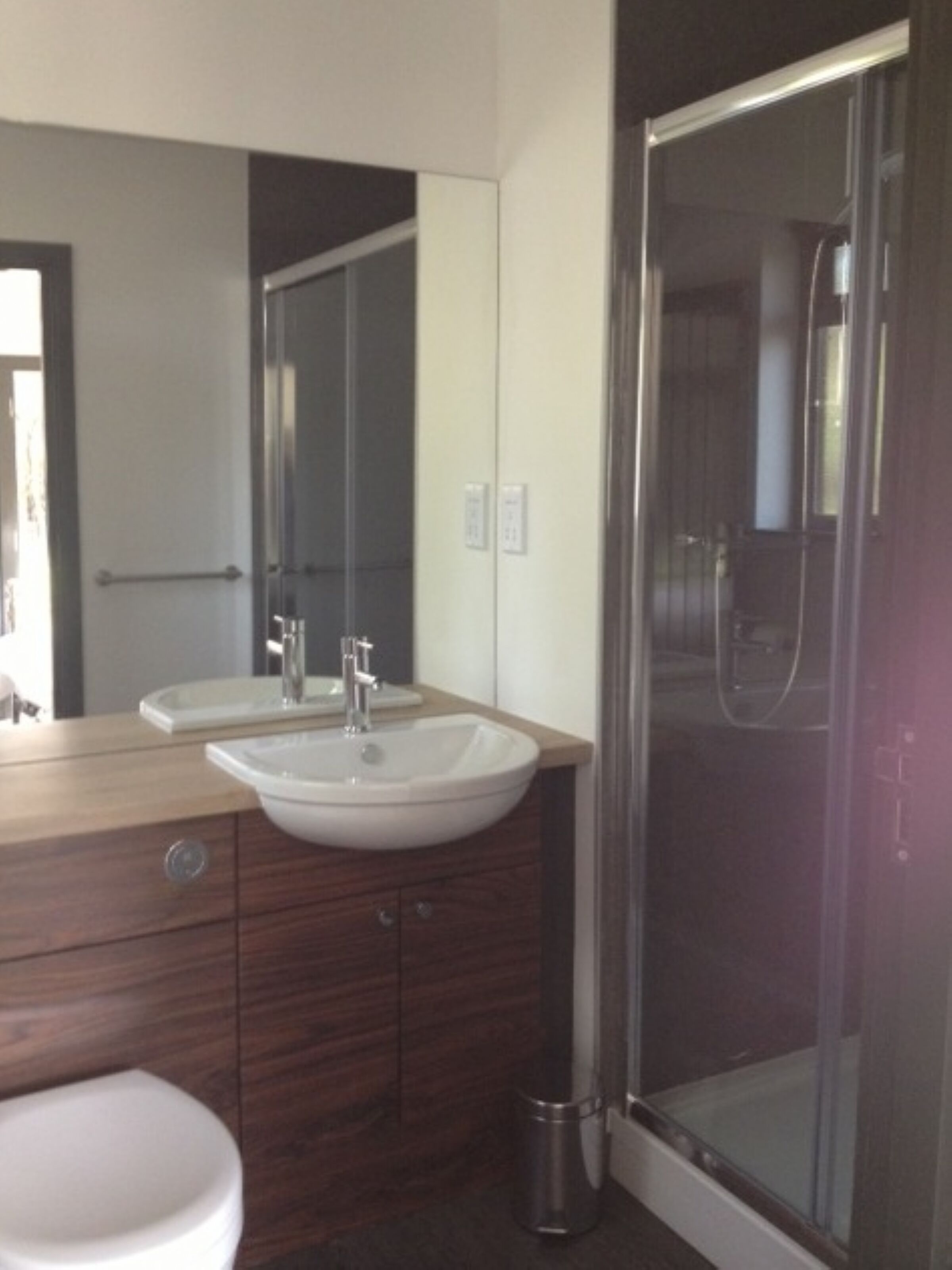 Shower, hair dryer, towels, toilet paper