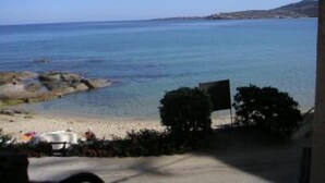 A coastal view with a clear sky, a sandy beach, and a rocky shoreline. - Apartment/ flat - ALGAJOLA (Algajola)