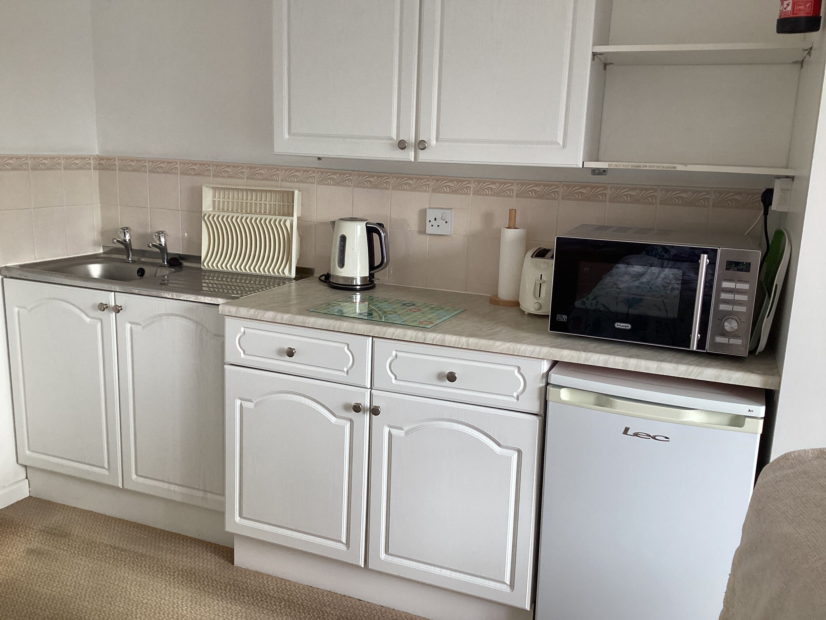 Fridge, microwave, electric kettle, toaster