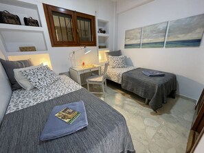 2 habitaciones, tabla de planchar con plancha y wifi gratis