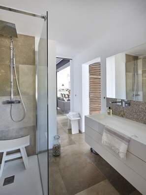 Bathtub, hair dryer, towels, soap