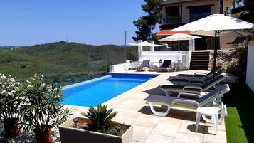 Outdoor pool, pool loungers