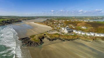 On the beach, sun-loungers