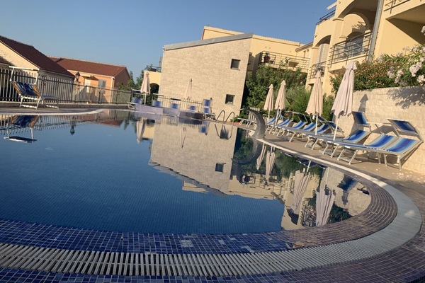 Family pool with sunbeds