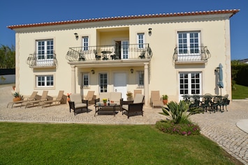 Front of Villa. 8 loungers available.