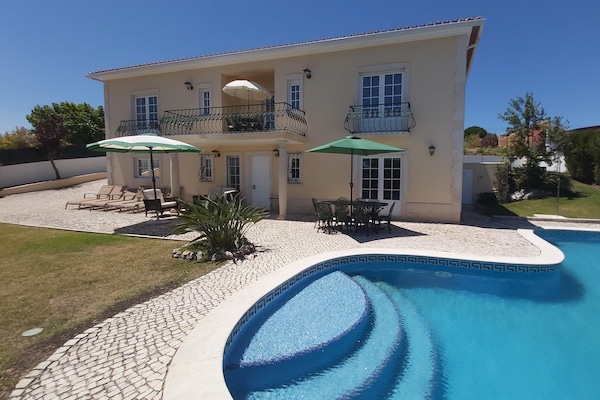 Front view of house and pool