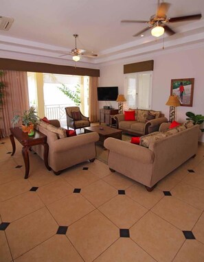 Living room with large patio doors that open onto the balcony