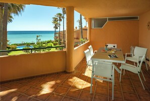 A terrace with a view of the sea, a pool, and a dining area with a table and chairs. - Fantastic Views. 2 pools. 3m from Beach  Special offer May / June  €65 per night (Buenas Noches)