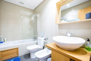 Combined shower/tub, jetted tub, hair dryer, bidet