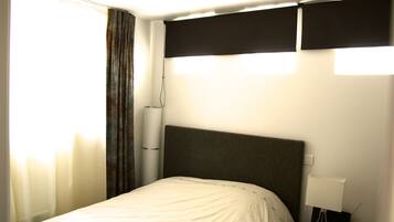 1 chambre, fer et planche à repasser, Wi-Fi gratuit, draps fournis