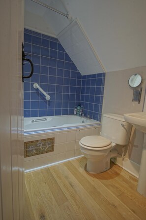 Combined shower/tub, hair dryer, towels, soap