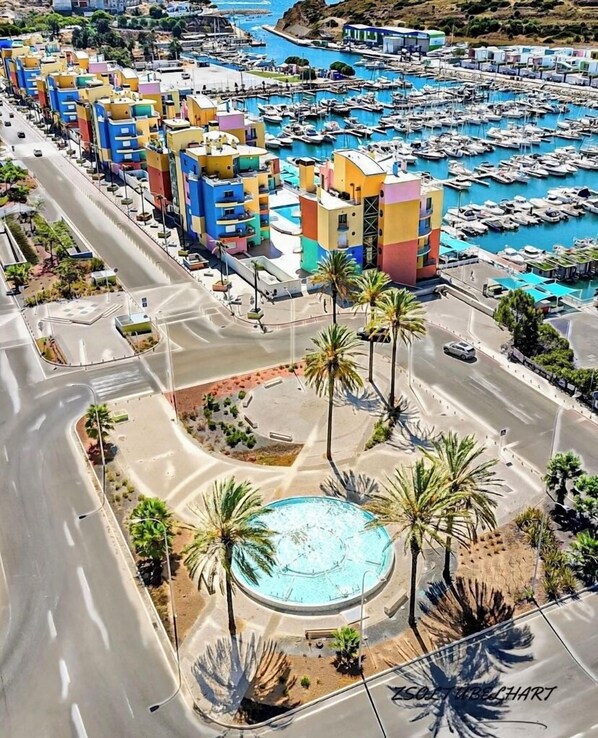 A heated pool, sun loungers