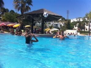 Outdoor pool, a heated pool, sun loungers