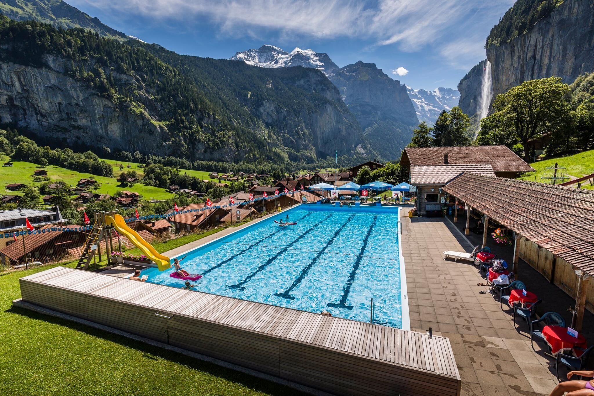 Swimming pool in Lauterbrunnen with view of waterfall ,mountains