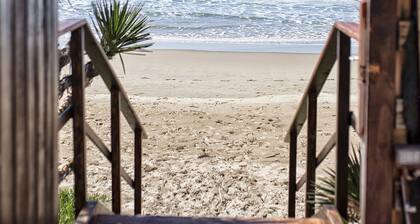 Haus mit Garten mit Blick auf den Strand