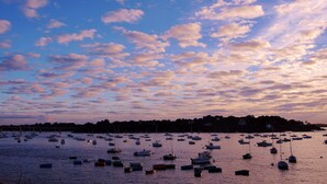 A harbor filled with boats during sunset. - Peaceful rural retreat  (Saint-Hélen)
