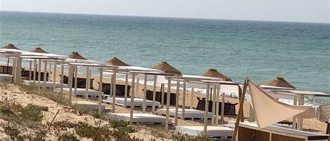 Beach nearby, sun loungers