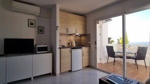 Fridge, microwave, stovetop, coffee/tea maker - Air Conditioned Studio Apartment, Pool, Sea Views, Wi-Fi, UK & Irish TV + sports (puerto del carmen)