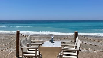 Enjoy a tranquil beachside retreat with a deck, perfect for dining al fresco.