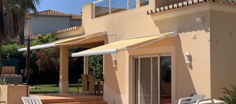 Large private detached three bedroom villa with heated infinity swimming pool
