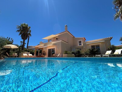 Large detached three bedroom villa with heated infinity pool and BBQ area.