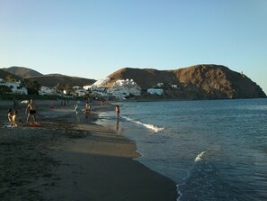 On the beach, sun loungers