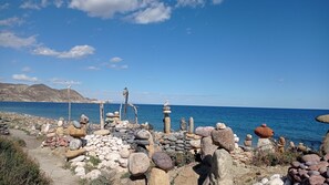 On the beach, sun loungers