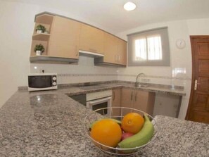 Fridge, microwave, oven, coffee/tea maker
