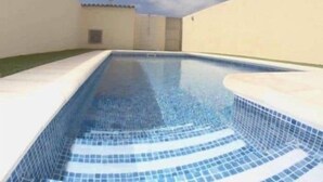 An indoor swimming pool with clear blue water, surrounded by walls and a tiled floor. - FABULOUS DUPLEX C6 WITH PRIVATE POOL (Adeje)