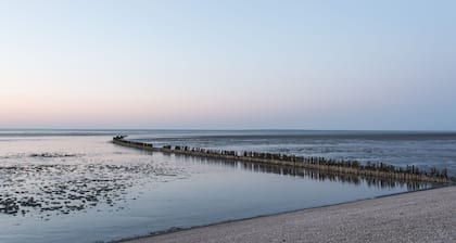 Pitoresk Fiskershuske auf dem Wattenmeer