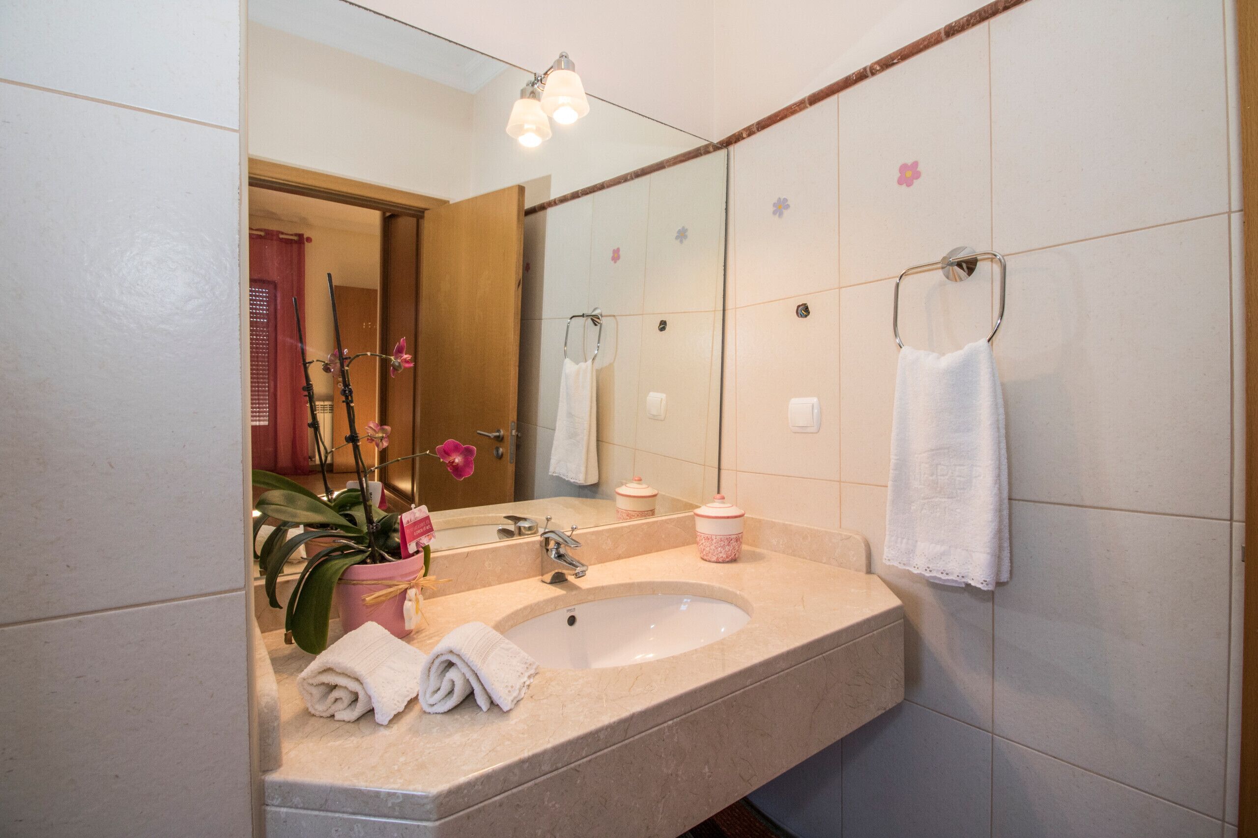 Bathtub, hair dryer, towels