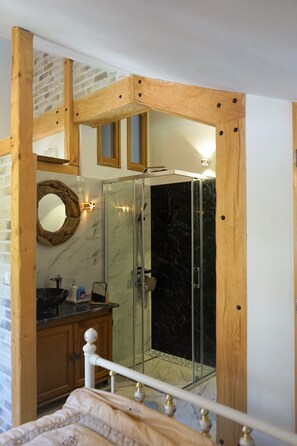 Combined shower/tub, jetted tub, hair dryer, bidet