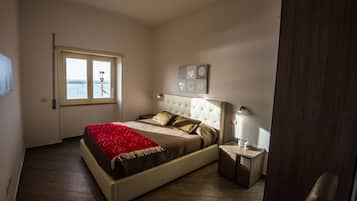 3 habitaciones, tabla de planchar con plancha y cuna de viaje