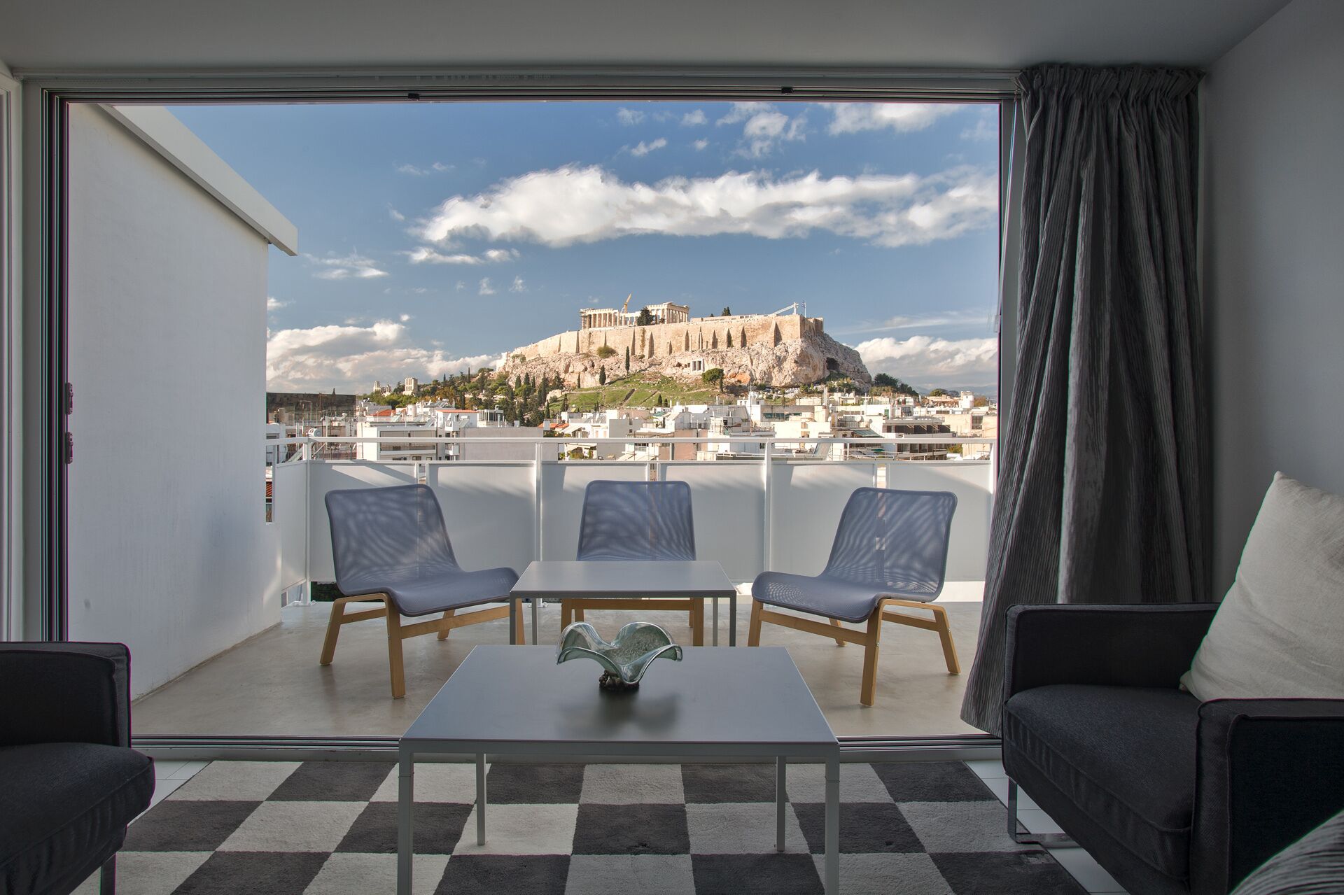 Living room with balcony and panoramic view of the Acropolis