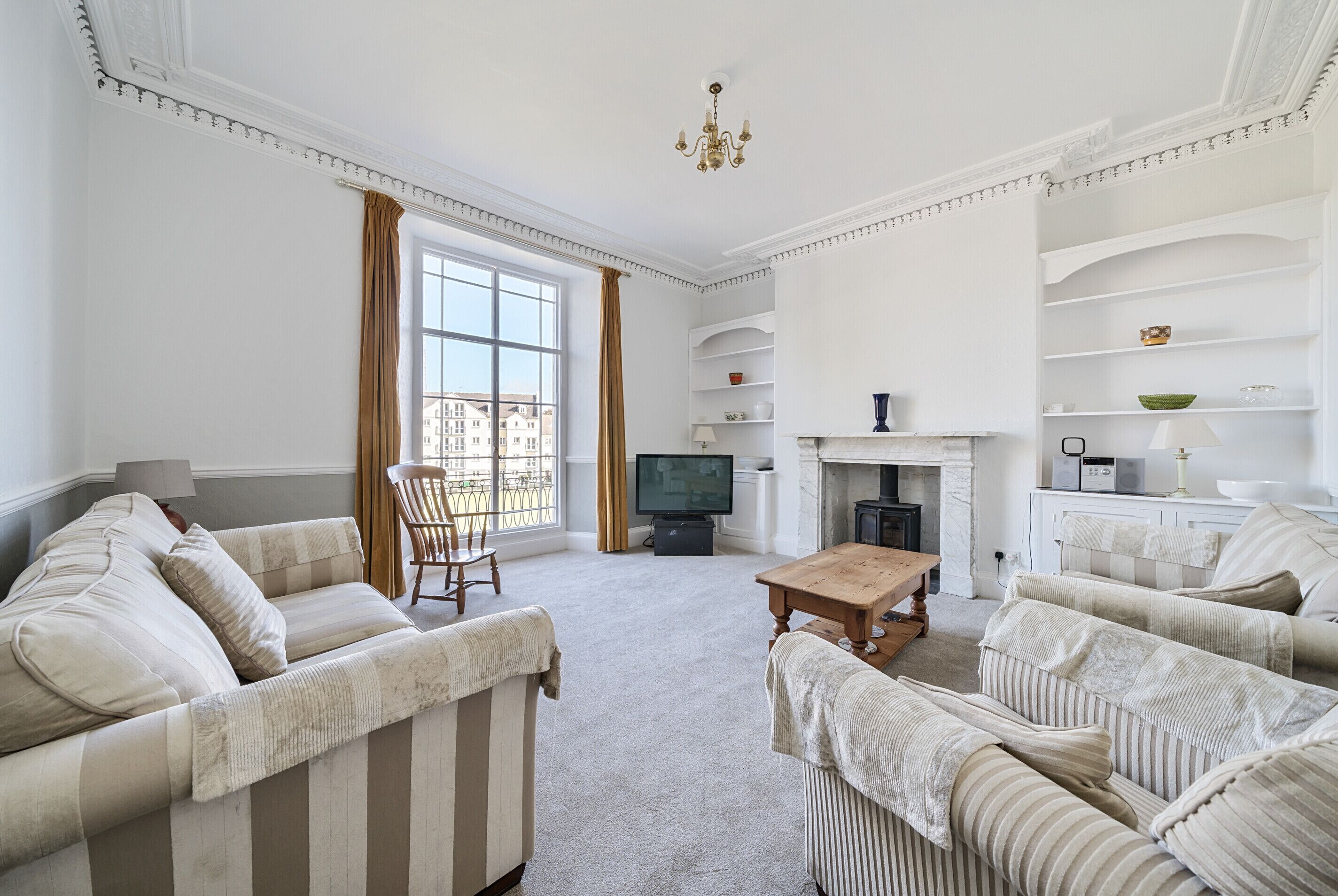 First floor sitting room with views to bowling green.