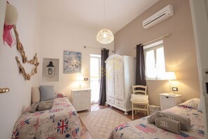 4 slaapkamers, een strijkplank/strijkijzer, gratis wifi, beddengoed