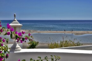 A la platja, gandules de platja i tovalloles de platja