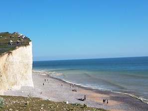 On the beach, sun-loungers - Fabulously Located, Stylish Beachfront Apartment with Free Private Parking (Eastbourne)