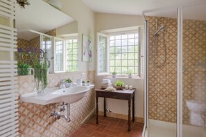 Bathtub, hair dryer, towels