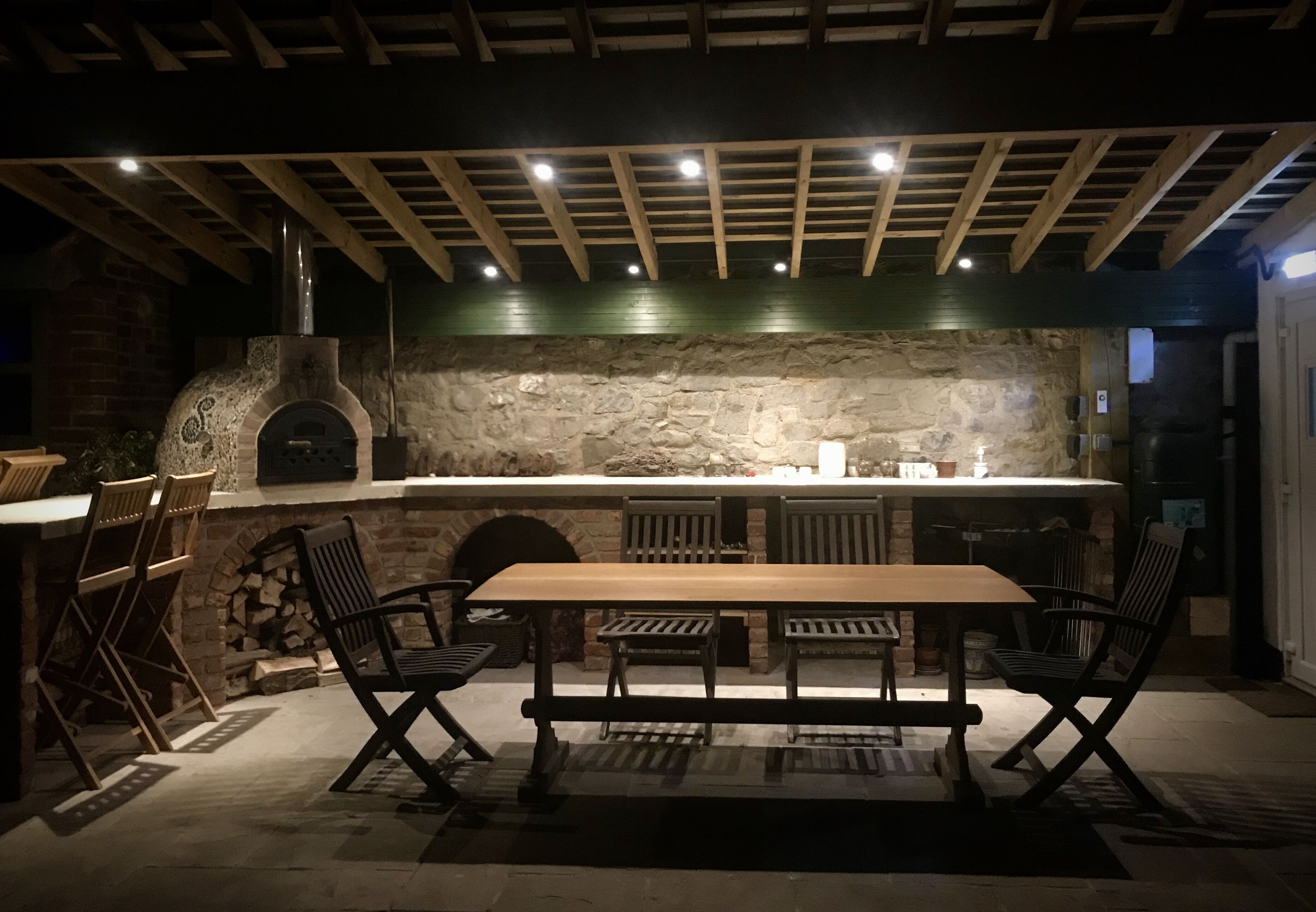 Sheltered garden kitchen. Multi-coloured back lighting options. 4 power sockets.