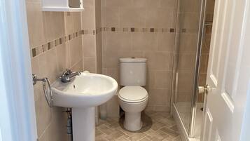 Shower, hair dryer, toilet paper