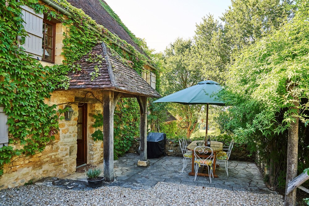 An old stone cottage full of rustic charm with pool and stunning views